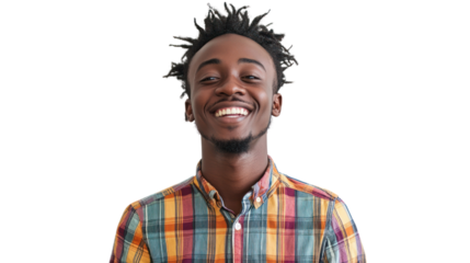 A joyful young man with a beaming smile and stylish hair, wearing a colorful plaid shirt.