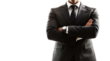 Confident businessman in a suit with arms crossed, standing against a white isolated background.