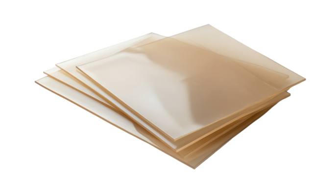 Set of translucent plastic sheets stacked together on a white isolated background.