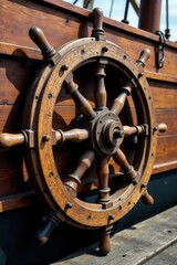 Obraz premium Weathered wooden ship wheel, wooden ship wheel, vintage