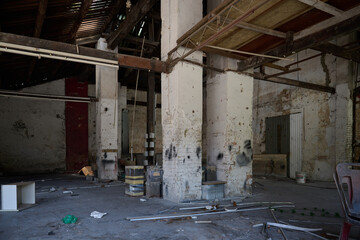 Abandoned Warehouse with Standing Pillars and Scattered Debris