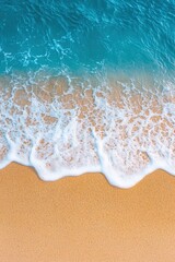 Clean beach with waves washing over footprints, symbolizing serenity and environmental care