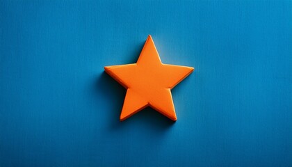 Obraz premium orange star on blue background