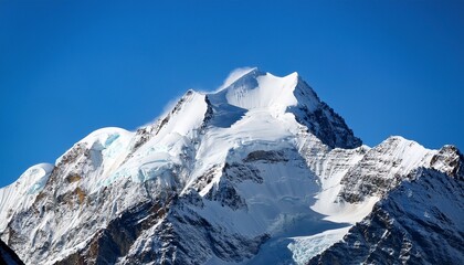 Obraz premium snow covered mountain peak under clear blue sky