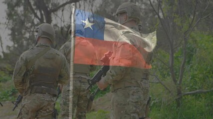 In forest, soldiers in camouflage uniforms with Chilean flag animation overlay - Powered by Adobe