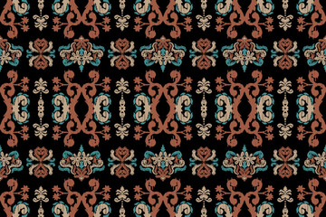 Carpet ikat floral pattern,fabric pattern on navy blue background vector illustration.Ikat ethnic oriental embroidery.Aztec style,abstract background.design for texture,clothing,decoration,carpet,rug.