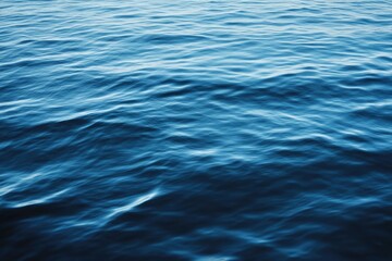 Deep ocean water surface texture, calm waves, outdoor water body, tranquil sea