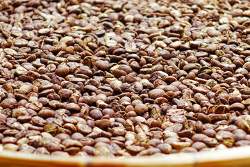 Top view background of brown coffee beans