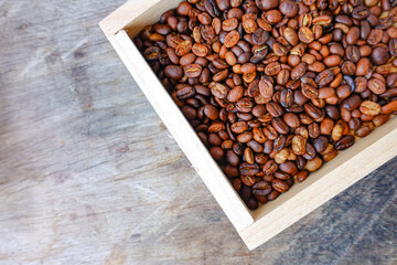 Close-Up of Roasted Coffee Beans in Wooden Box