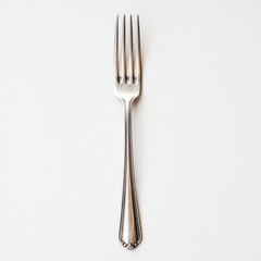 Elegant Silver Fork on White Backdrop: Culinary Still Life for Food Blogs and Kitchen Decor