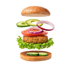 Floating ingredients of a veggie burger, including lettuce, tomato, cucumber, patty, and bun. concept of food preparation