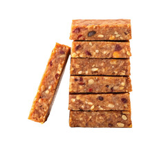 Close-up of stacked granola bars with nuts and dried fruits. healthy snack or energy food