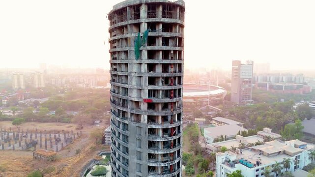 Drone view of forsaken skyscraper above the city