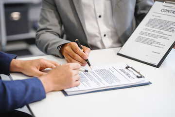 A businessman and a male lawyer or a team of judges discuss a joint investment meeting. They provide legal advice, review contracts, and ensure compliance with business laws and regulations