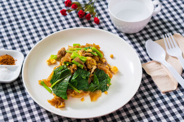 Stir fried soy sause noodles with pork