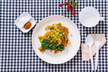 Stir fried soy sause noodles with pork