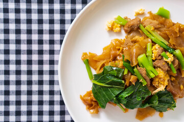 Stir fried soy sause noodles with pork