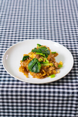 Stir fried soy sause noodles with pork