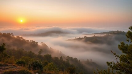 Obraz premium Serene Sunrise Over Misty Hills and Valley at Dawn