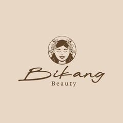 Elegant beauty logo with woman and flowers