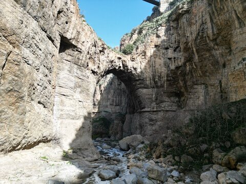 natural stone arc and a river passing underneath 
constantine algeria
cirta
RAW Files available.