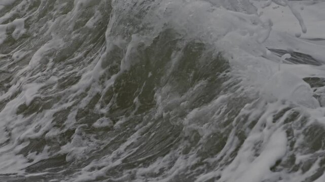 Ocean waves crashing in super slow motion on the beach at Domburg, Zeeland
