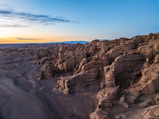 Spectacular yardang landform mountain at sunset. The famous Dahaidao no man's land natural landscape in Xinjiang, China.