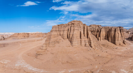 Panorama of the unique yardang landform under a clear blue. The famous Dahaidao no man's land natural landscape in Xinjiang, China.