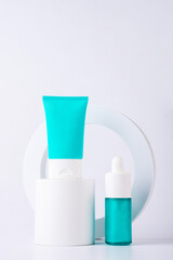 Cosmetic bottle, Skin care or sunscreen cosmetic with stylish props on white background. 