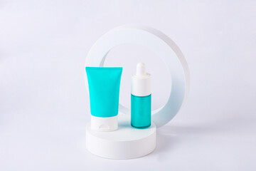 Cosmetic bottle, Skin care or sunscreen cosmetic with stylish props on white background.