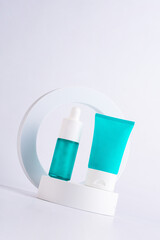 Cosmetic bottle, Skin care or sunscreen cosmetic with stylish props on white background. 