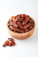 Dates fruit tunisia, Tunisian honey dates, in bowl isolated on white background