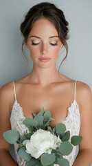 Naklejka premium Ethereal Botanical Bridal Portrait Soft Romantic Minimalist Wedding Style with Eucalyptus and Lace - Modern Elegance in Contemporary Matrimonial Fashion