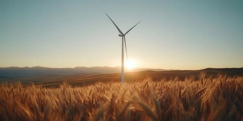 Obraz premium A Majestic Wind Turbine Standing Tall Amidst Golden Wheat Fields Under a Serene Sunset, Symbolizing the Harmony Between Nature and Renewable Energy in Rural Landscapes.
