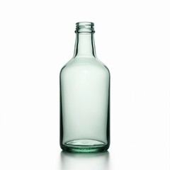 Isolated studio shot of empty clear transparent glass bottle with rounded shape, narrow neck, without cork. Clean object with subtle green color, reflection. For alcohol drinks, water, oil, perfume
