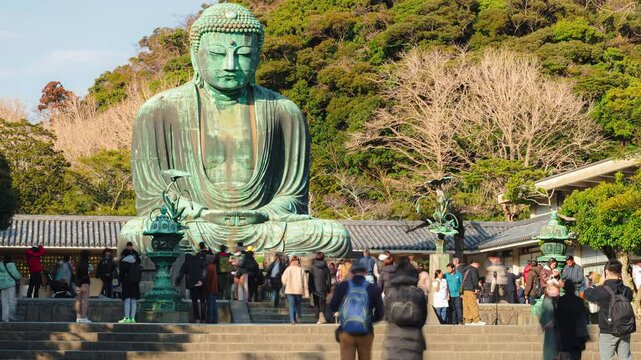 Kamakura,Japan 16 February 2025 : Time lapse Great Buddha in Kamakura, Japan with people tourist. 