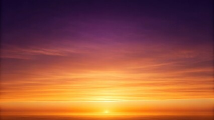 Obraz premium a vibrant sunset, a mesmerizing display of colors across the sky. The colors transition from shades of orange, and purple, creating a dramatic and awe-inspiring scene.