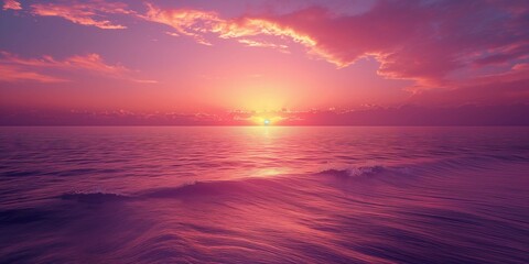 Fototapeta premium A tranquil sunset over the ocean, with vibrant pink and purple hues reflecting on calm waters.