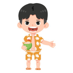 child holding a coconut at the beach