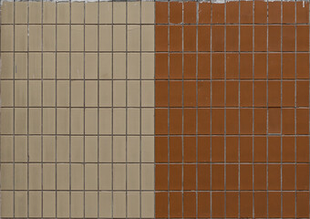 The wall is covered with square ceramic tiles in two contrasting colors, beige and brown. Textured wall mockup. Close-up.