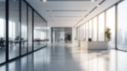 Blur background of office interior with large windows with city urban view, plants, and wooden desks at sunset. Modern workplace	