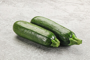 Raw green ripe zucchini vegetable