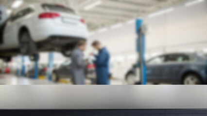 Car Repair Workshop with Mechanics at Work