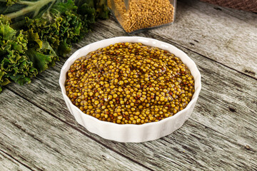 Mustard sauce with seeds in the bowl