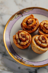 mini cinnamon rolls on fancy plate
