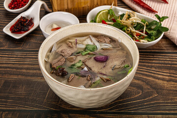 Vietnamese Pho Bo soup with beef and noodles