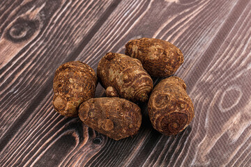 Brown topinambur roots for cooking