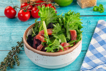 Salad with salmon and arugula