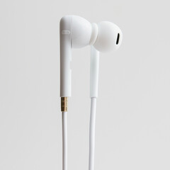 Fototapeta premium Breathable Earphone on White Background, combining comfort and high-quality sound for everyday listening