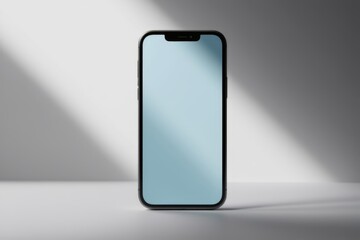 a close up of a phone with a blue screen on a table